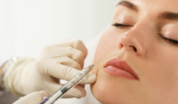 Close-up of a woman receiving injectable fillers